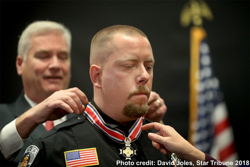 Officer Falconer receiving the Congressional Badge of Bravery in 2018.